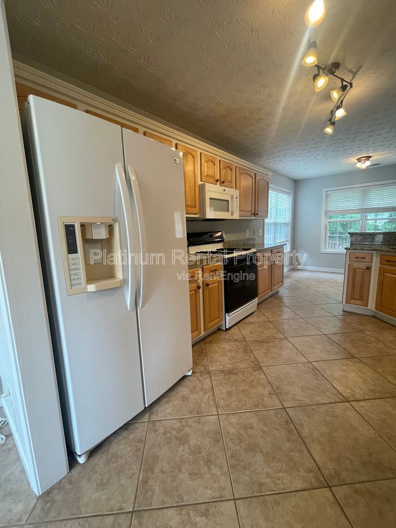 Desirable 4 bedroom floorplan featuring primary suite on the main level by Platinum Property Management Services, Inc. property image