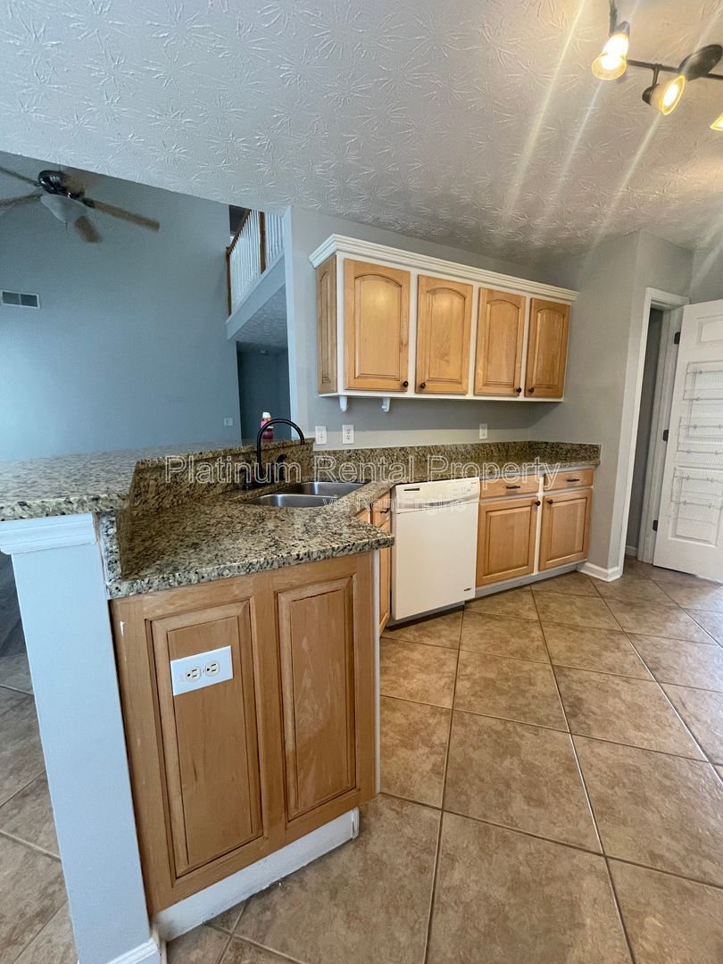 Desirable 4 bedroom floorplan featuring primary suite on the main level by Platinum Property Management Services, Inc. property image
