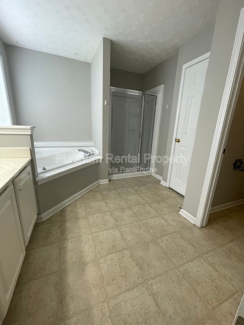 Desirable 4 bedroom floorplan featuring primary suite on the main level by Platinum Property Management Services, Inc. property image