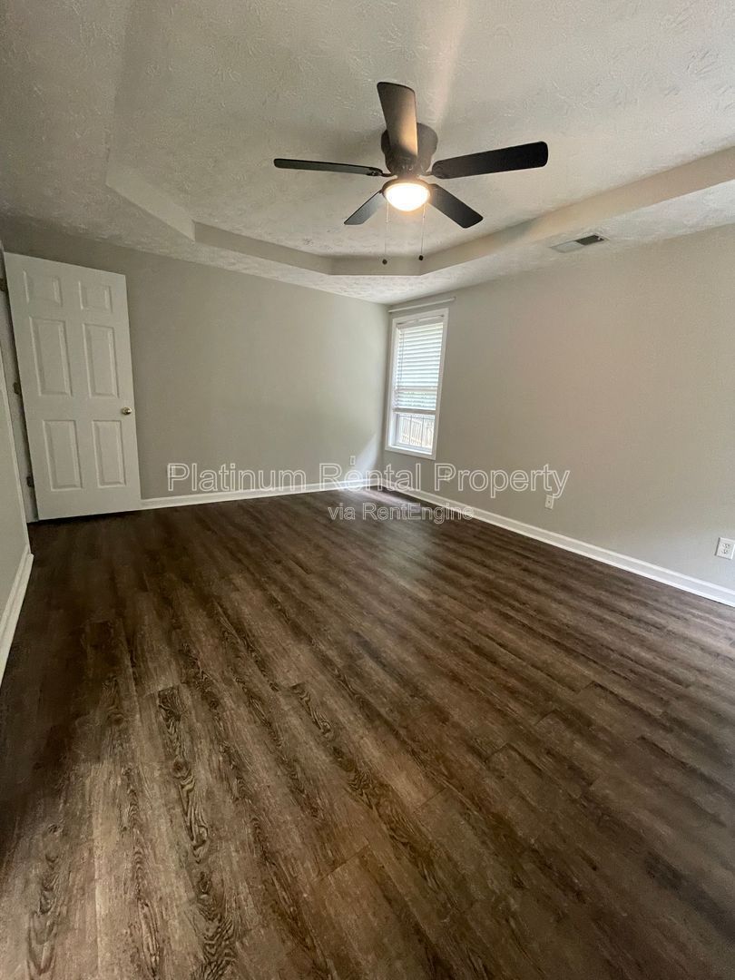 Desirable 4 bedroom floorplan featuring primary suite on the main level by Platinum Property Management Services, Inc. property image