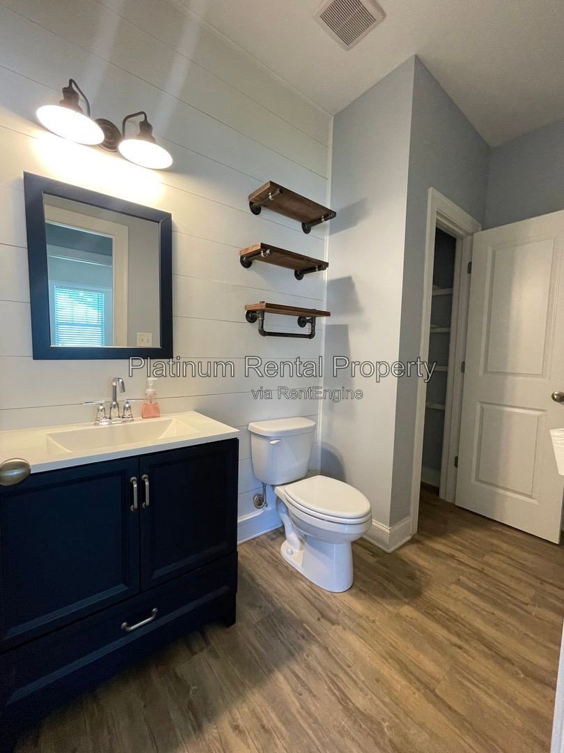 Exquisite 4 bedroom home on full basement in highly sought after Forsyth county neighborhood by Platinum Property Management Services, Inc. property image