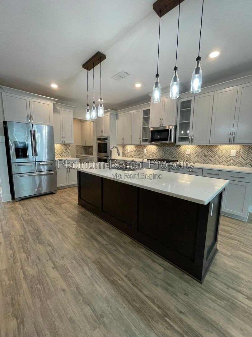 Exquisite 4 bedroom home on full basement in highly sought after Forsyth county neighborhood by Platinum Property Management Services, Inc. property image