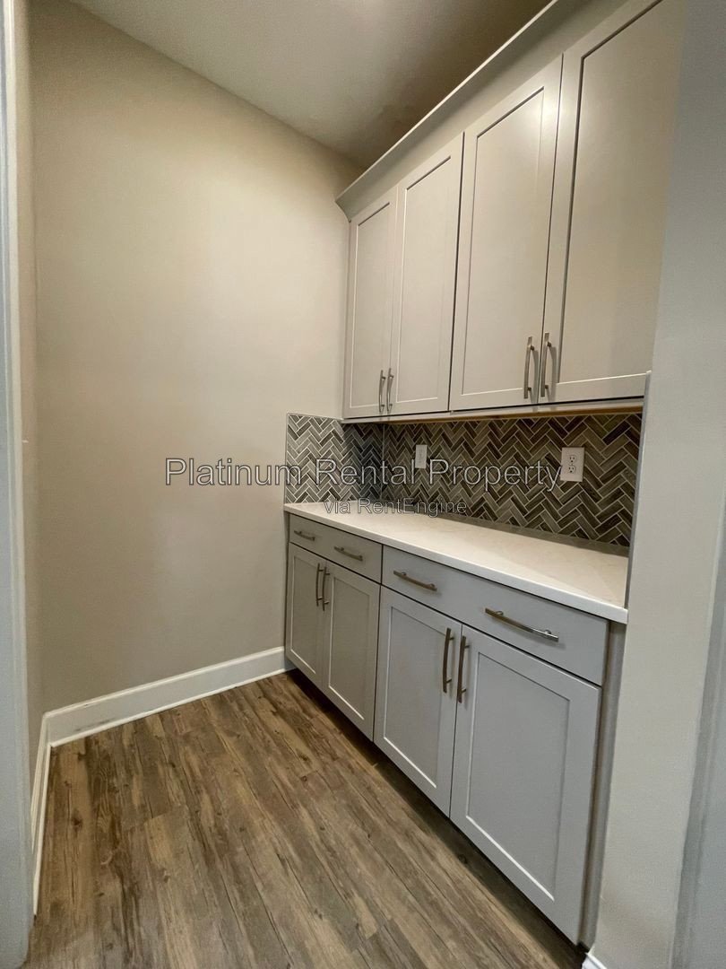 Exquisite 4 bedroom home on full basement in highly sought after Forsyth county neighborhood by Platinum Property Management Services, Inc. property image