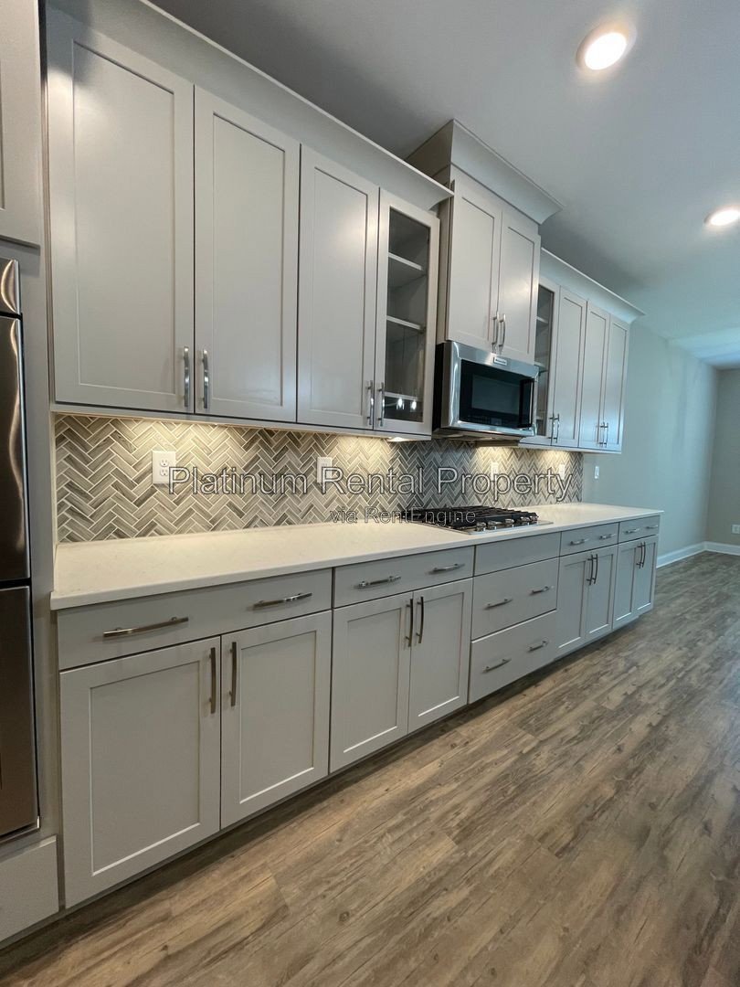 Exquisite 4 bedroom home on full basement in highly sought after Forsyth county neighborhood by Platinum Property Management Services, Inc. property image