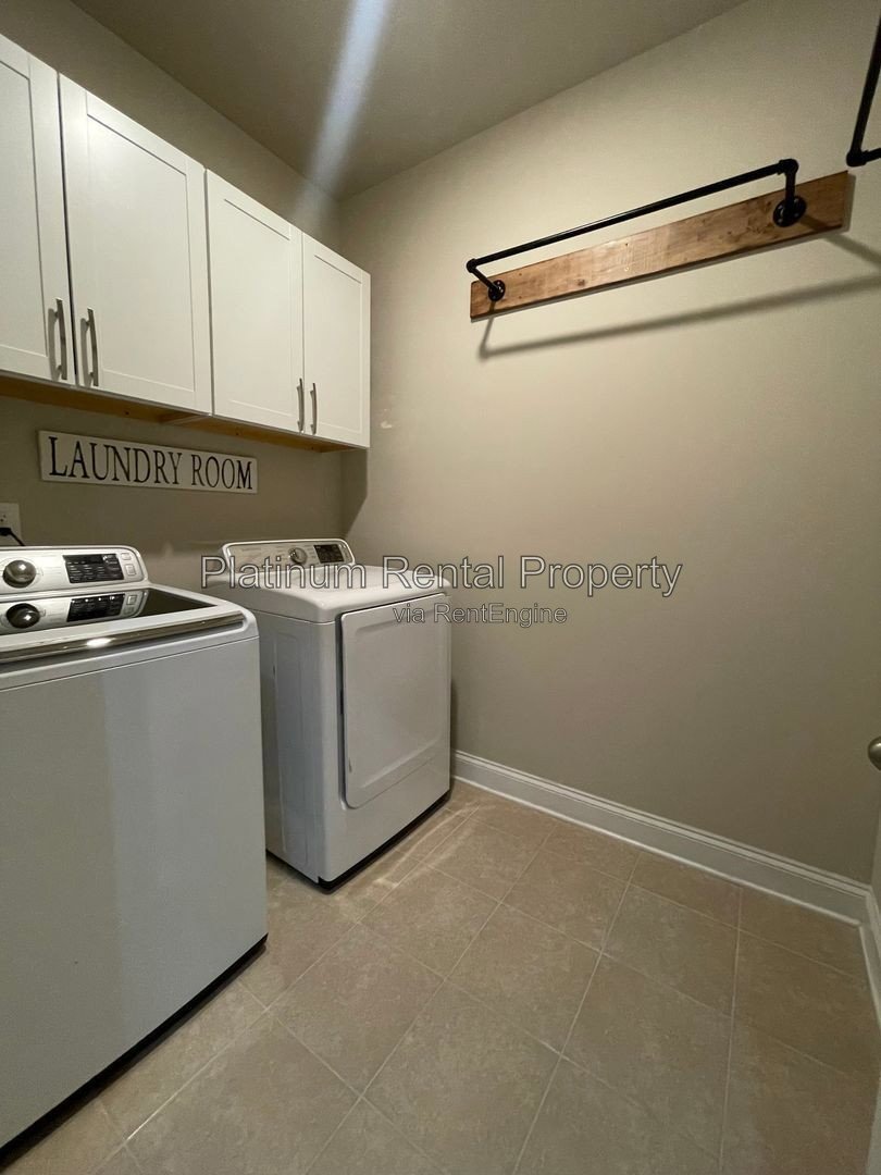 Exquisite 4 bedroom home on full basement in highly sought after Forsyth county neighborhood by Platinum Property Management Services, Inc. property image