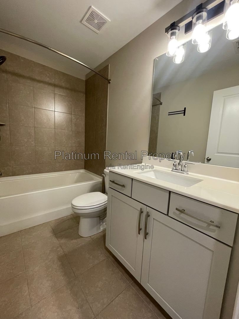 Exquisite 4 bedroom home on full basement in highly sought after Forsyth county neighborhood by Platinum Property Management Services, Inc. property image