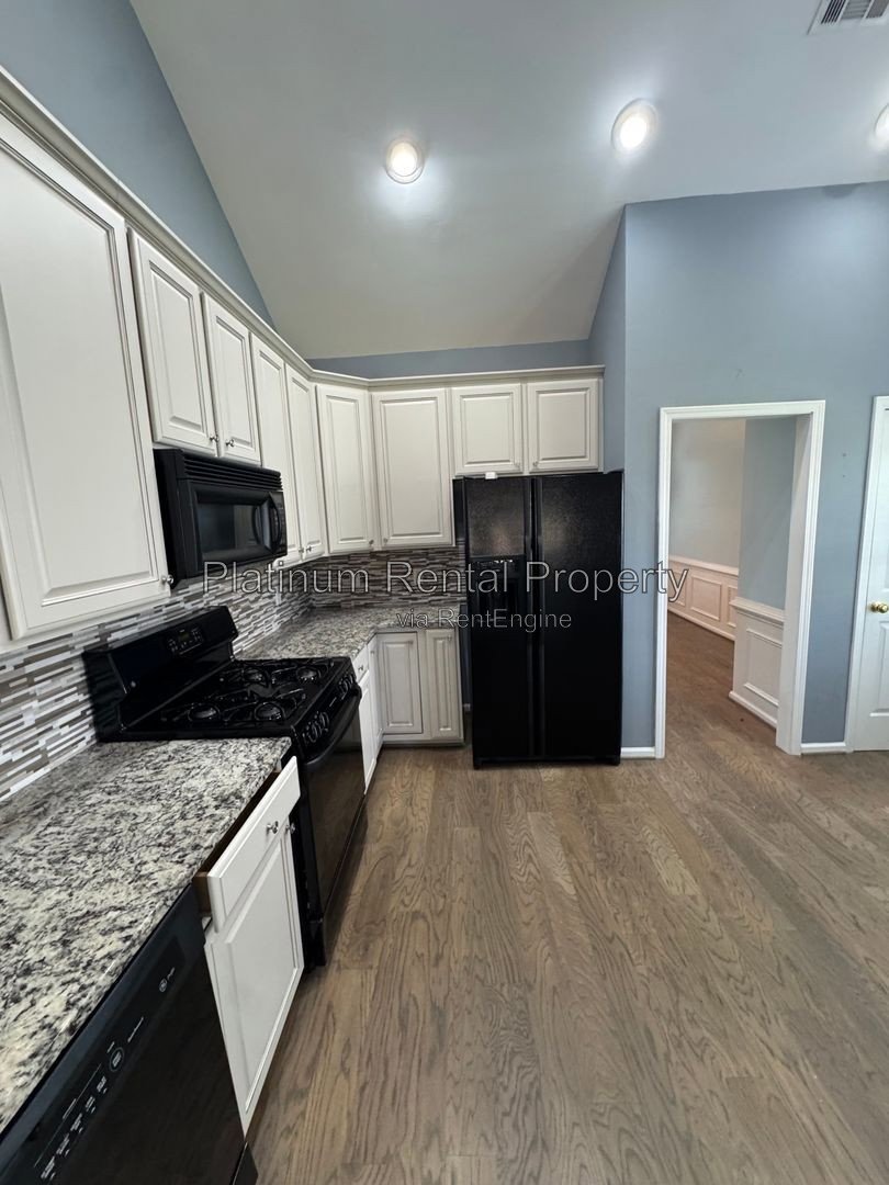 Wonderful, 3 bedroom home with primary suite on the main in one of the most sought after areas in Suwanee, by Platinum Property Management Services, Inc. property image