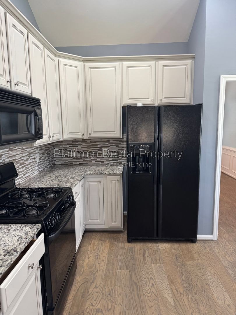 Wonderful, 3 bedroom home with primary suite on the main in one of the most sought after areas in Suwanee, by Platinum Property Management Services, Inc. property image