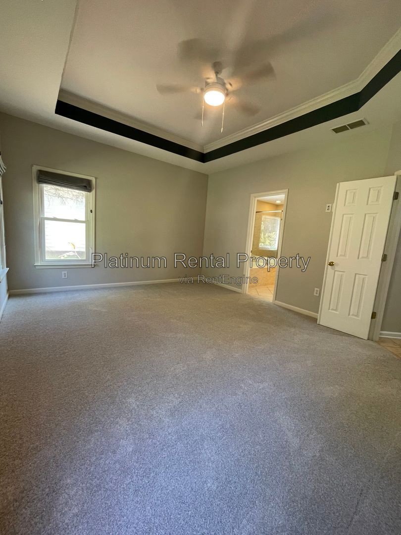 Wonderful, 3 bedroom home with primary suite on the main in one of the most sought after areas in Suwanee, by Platinum Property Management Services, Inc. property image