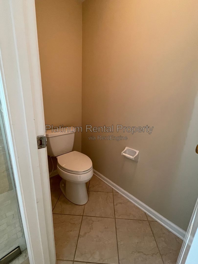 Wonderful, 3 bedroom home with primary suite on the main in one of the most sought after areas in Suwanee, by Platinum Property Management Services, Inc. property image
