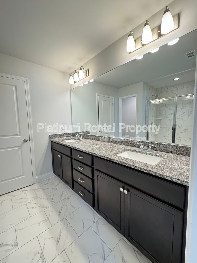 Beautiful 4 bedroom townhome in desirable Lawrenceville by Platinum Property Management Services, Inc. property image