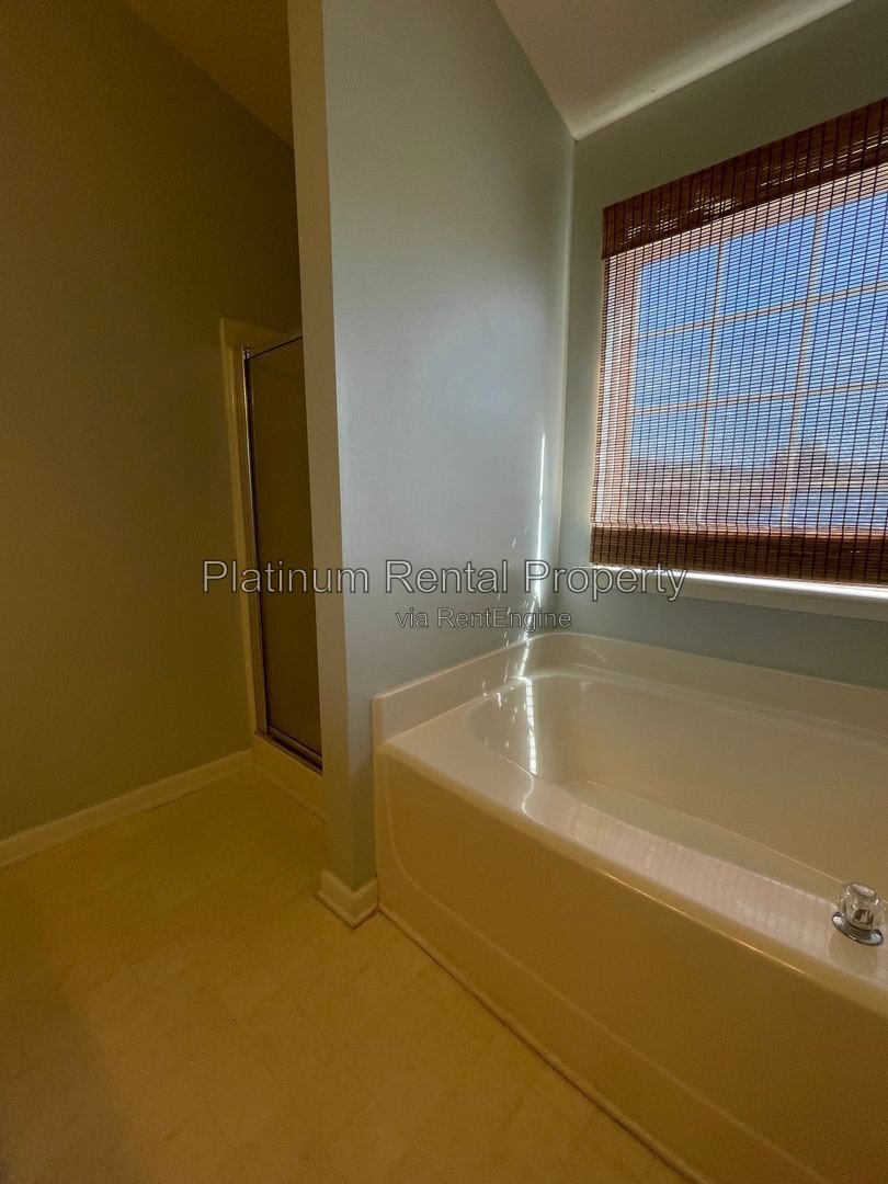 Fabulous 3 bedroom townhome in sought after Village at Weatherstone by Platinum Property Management Services, Inc. property image