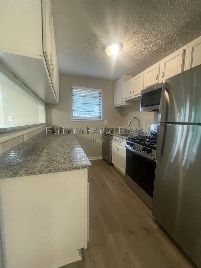 Wonderful 4 bedroom, split foyer home in convenient Stone Mountain by Platinum Property Management Services, Inc. property image