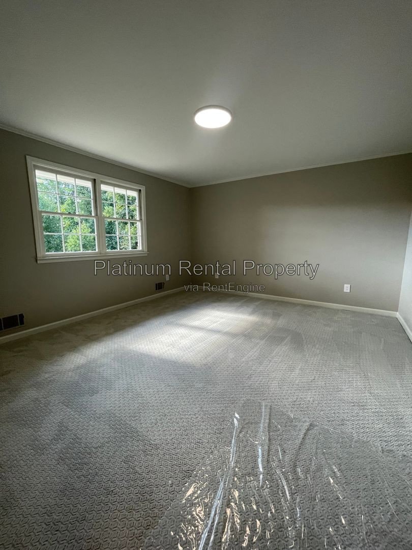Spectacular, sprawling 5 bedroom ranch home on finished basement in prime Suwanee location, by Platinum Property Management Services, Inc. property image