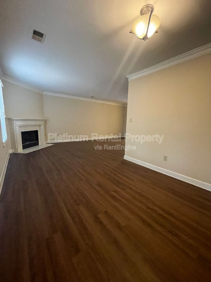 Location, Location, Location! This beautiful and well maintained three-bedroom townhome in convenient Peachtree Corners location is brought to you by Platinum Property Management Services, Inc. property image