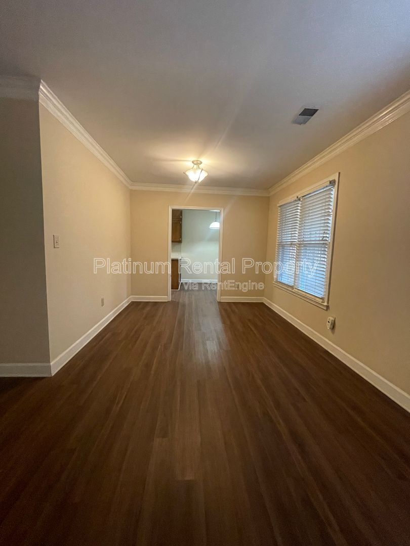 Location, Location, Location! This beautiful and well maintained three-bedroom townhome in convenient Peachtree Corners location is brought to you by Platinum Property Management Services, Inc. property image