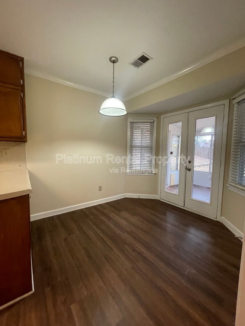 Location, Location, Location! This beautiful and well maintained three-bedroom townhome in convenient Peachtree Corners location is brought to you by Platinum Property Management Services, Inc. property image