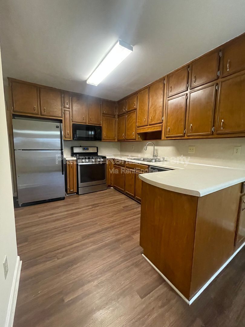 Location, Location, Location! This beautiful and well maintained three-bedroom townhome in convenient Peachtree Corners location is brought to you by Platinum Property Management Services, Inc. property image