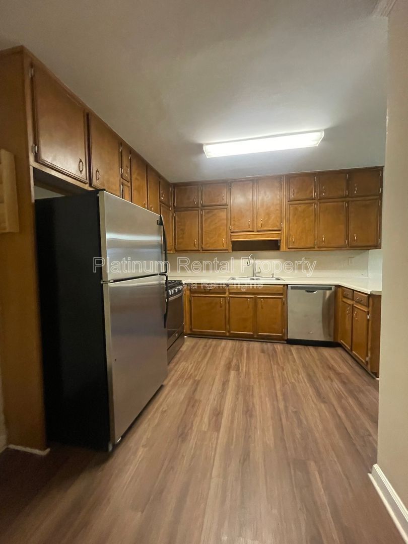 Location, Location, Location! This beautiful and well maintained three-bedroom townhome in convenient Peachtree Corners location is brought to you by Platinum Property Management Services, Inc. property image