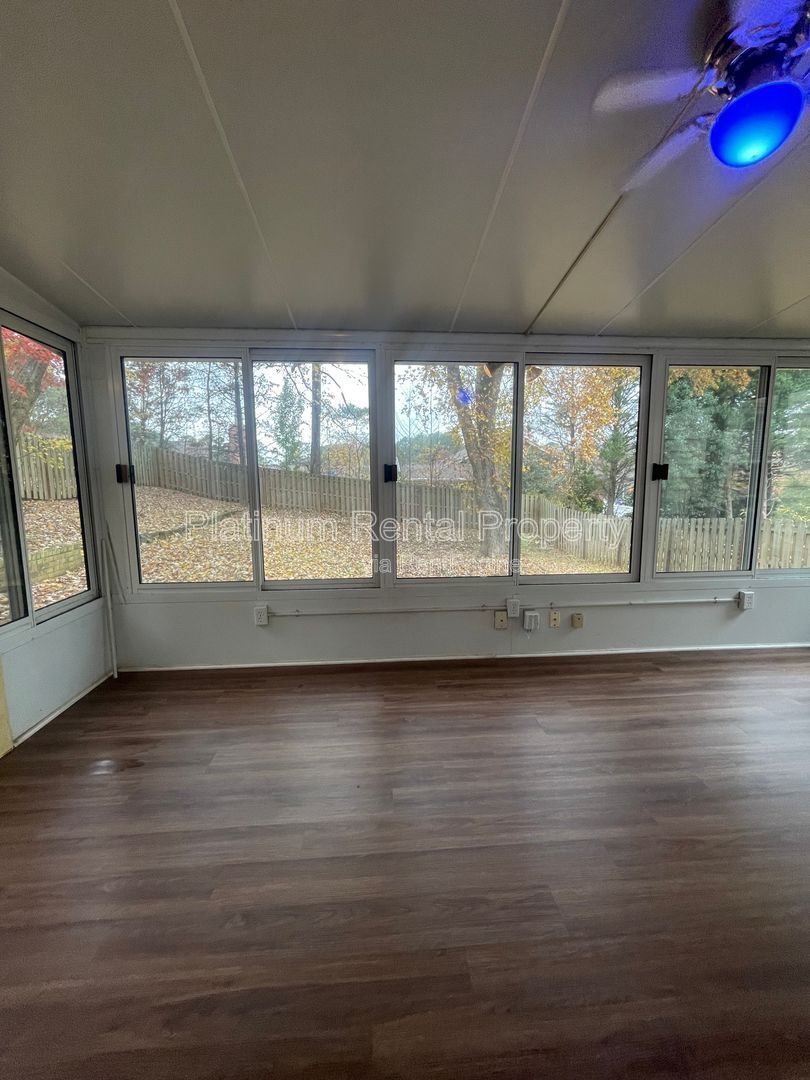 Location, Location, Location! This beautiful and well maintained three-bedroom townhome in convenient Peachtree Corners location is brought to you by Platinum Property Management Services, Inc. property image