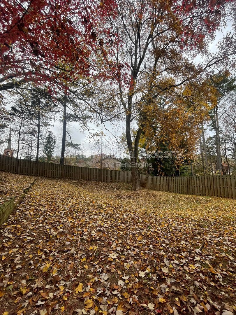 Location, Location, Location! This beautiful and well maintained three-bedroom townhome in convenient Peachtree Corners location is brought to you by Platinum Property Management Services, Inc. property image