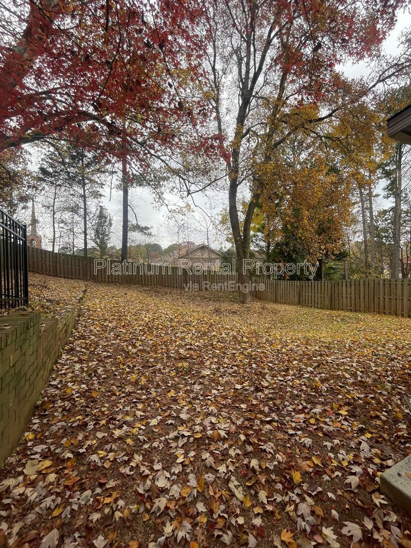 Location, Location, Location! This beautiful and well maintained three-bedroom townhome in convenient Peachtree Corners location is brought to you by Platinum Property Management Services, Inc. property image