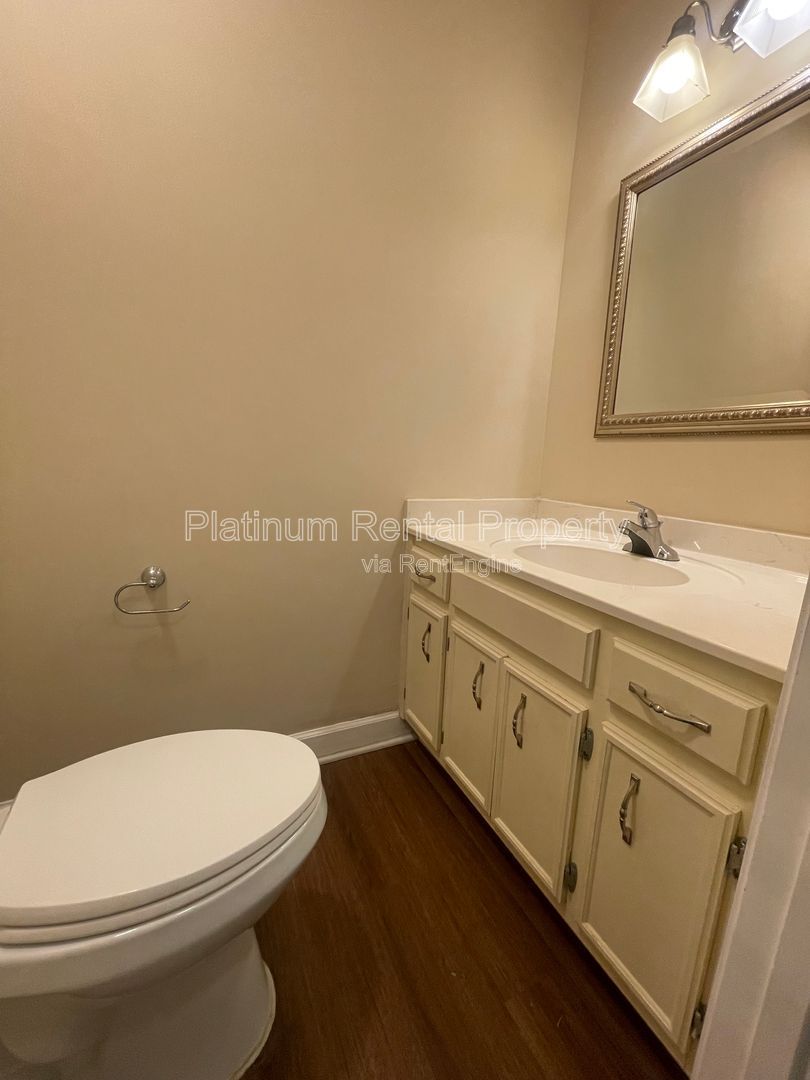 Location, Location, Location! This beautiful and well maintained three-bedroom townhome in convenient Peachtree Corners location is brought to you by Platinum Property Management Services, Inc. property image