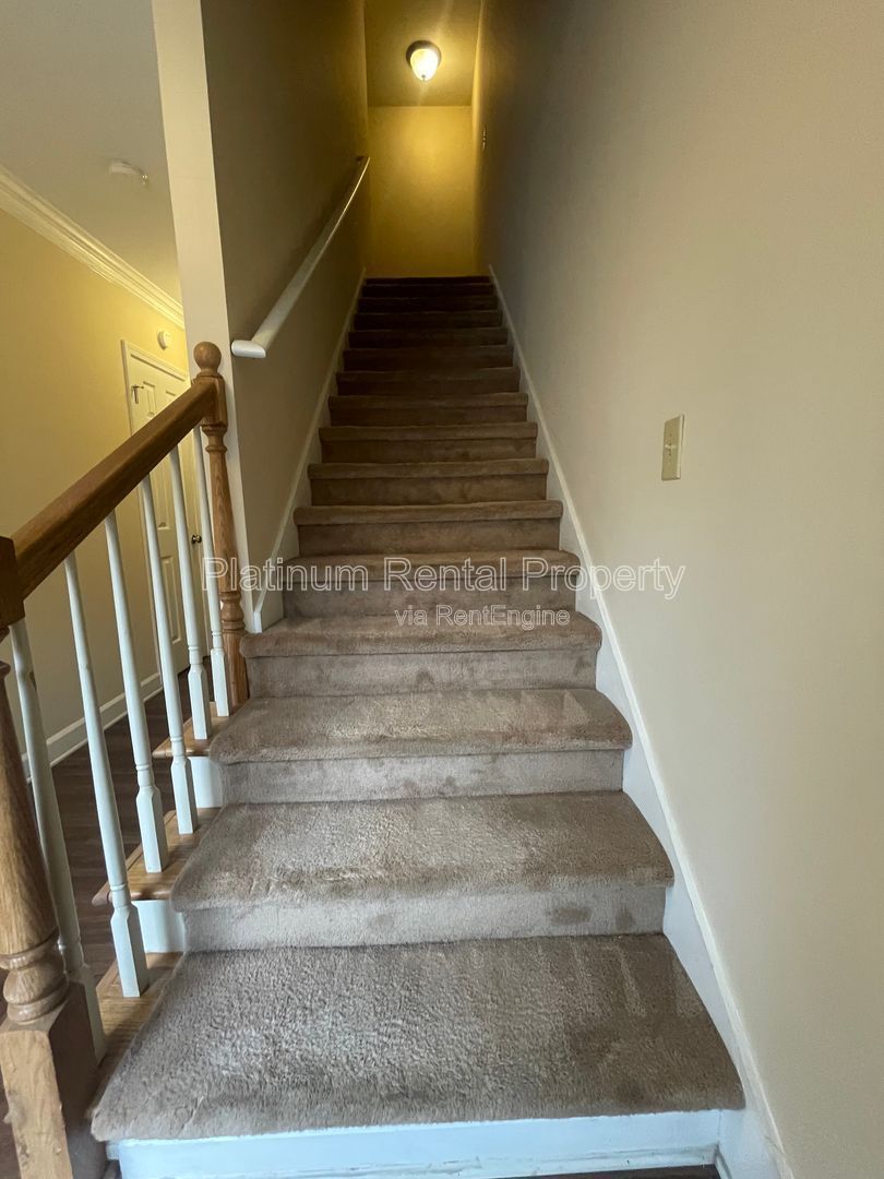 Location, Location, Location! This beautiful and well maintained three-bedroom townhome in convenient Peachtree Corners location is brought to you by Platinum Property Management Services, Inc. property image