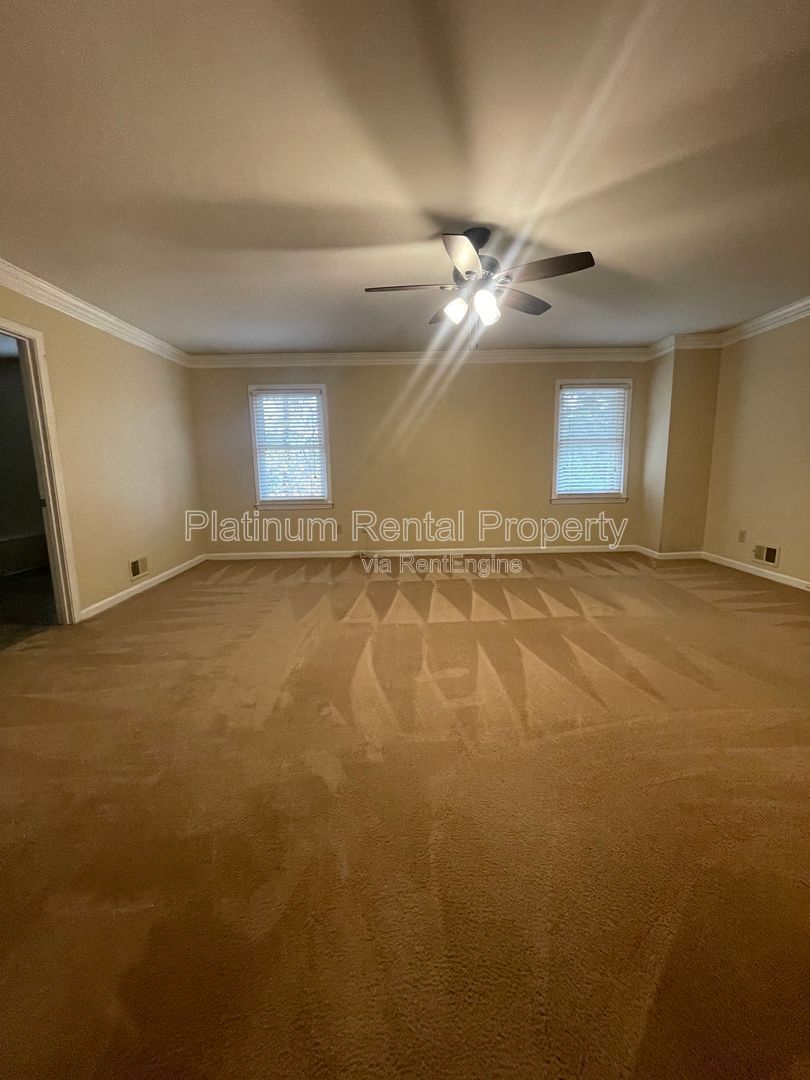 Location, Location, Location! This beautiful and well maintained three-bedroom townhome in convenient Peachtree Corners location is brought to you by Platinum Property Management Services, Inc. property image