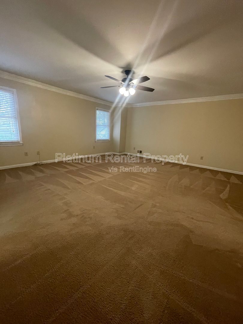 Location, Location, Location! This beautiful and well maintained three-bedroom townhome in convenient Peachtree Corners location is brought to you by Platinum Property Management Services, Inc. property image