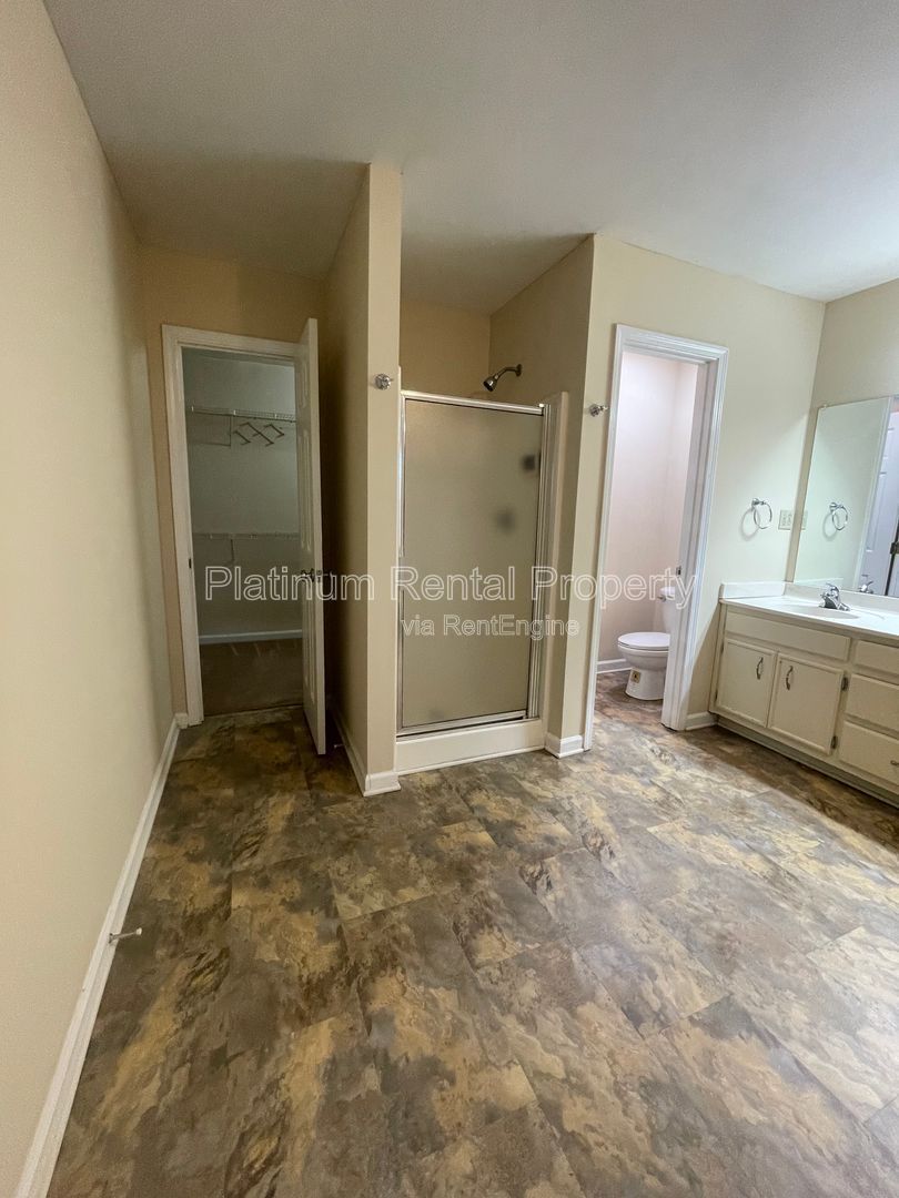 Location, Location, Location! This beautiful and well maintained three-bedroom townhome in convenient Peachtree Corners location is brought to you by Platinum Property Management Services, Inc. property image