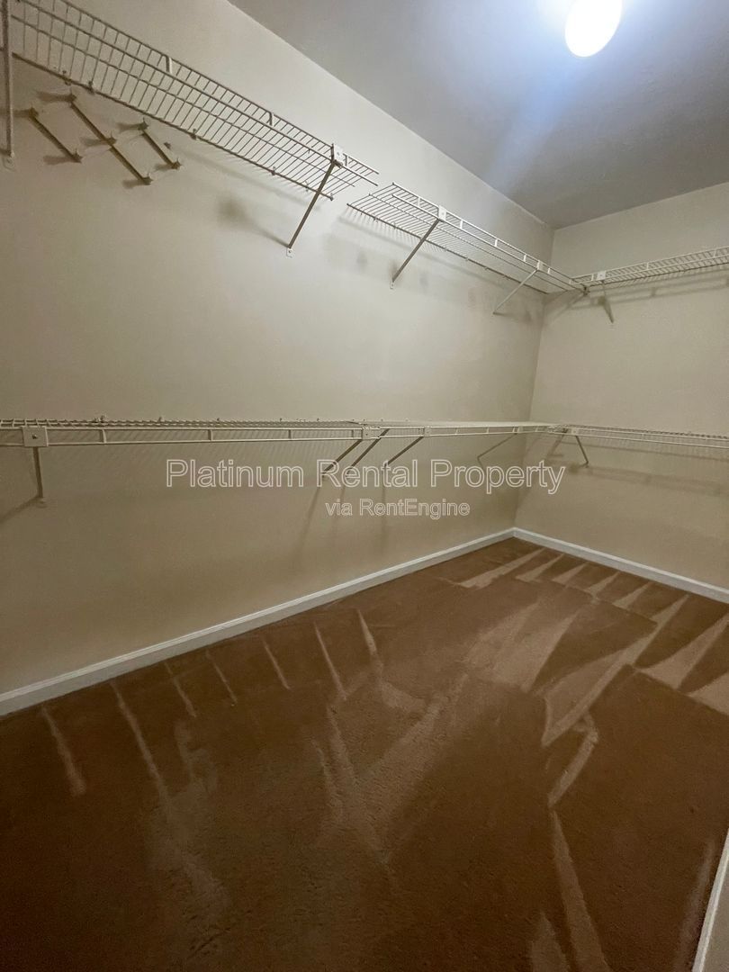 Location, Location, Location! This beautiful and well maintained three-bedroom townhome in convenient Peachtree Corners location is brought to you by Platinum Property Management Services, Inc. property image