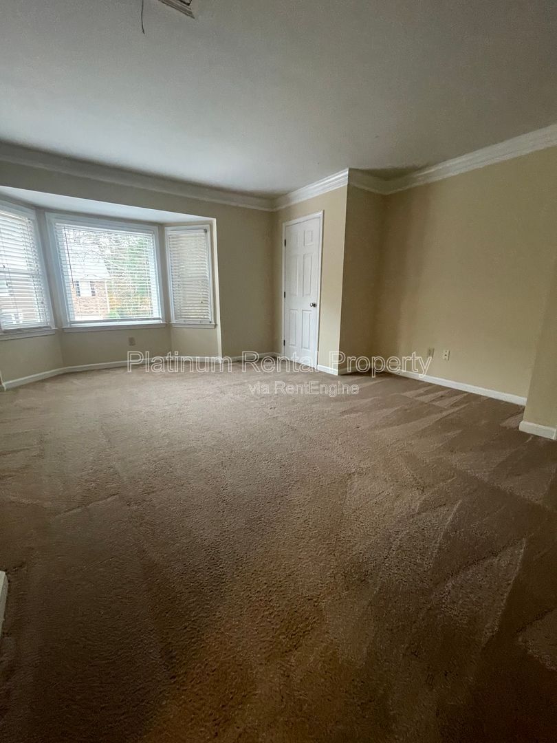 Location, Location, Location! This beautiful and well maintained three-bedroom townhome in convenient Peachtree Corners location is brought to you by Platinum Property Management Services, Inc. property image