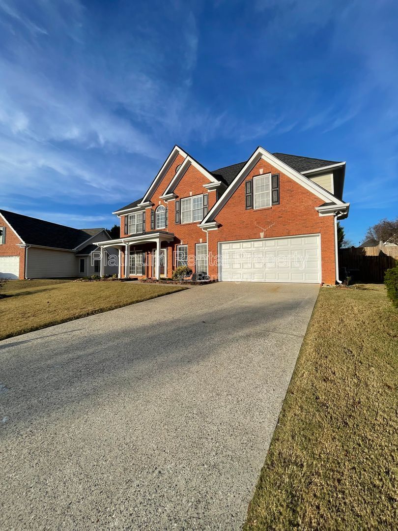 Come home for the holidays to this amazing 5 bedroom home in desirable Hampton Park subdivision in Buford, by Platinum Property Management Services, Inc. property image