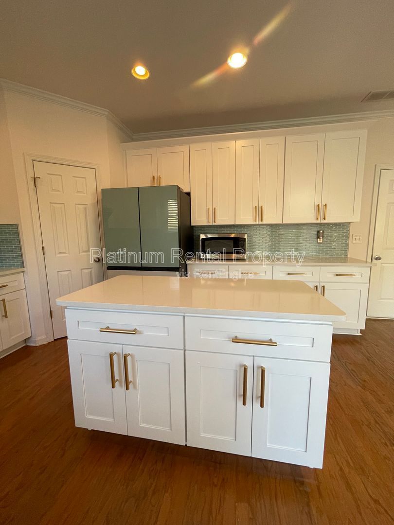 Come home for the holidays to this amazing 5 bedroom home in desirable Hampton Park subdivision in Buford, by Platinum Property Management Services, Inc. property image