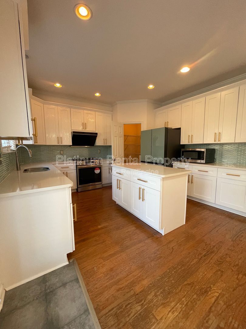 Come home for the holidays to this amazing 5 bedroom home in desirable Hampton Park subdivision in Buford, by Platinum Property Management Services, Inc. property image