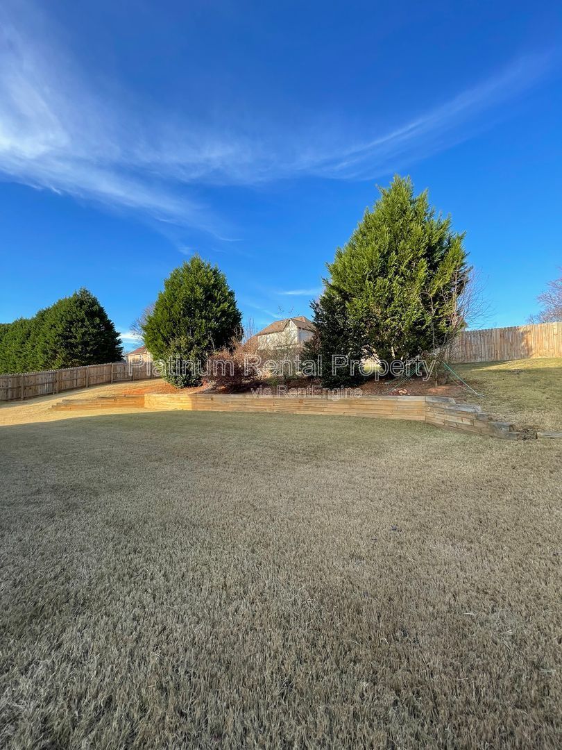 Come home for the holidays to this amazing 5 bedroom home in desirable Hampton Park subdivision in Buford, by Platinum Property Management Services, Inc. property image