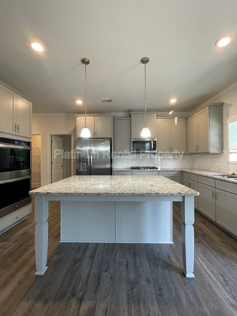 Stunning, 5-bedroom home in the highly sought after Tributary Community, by Platinum Property Management Services, Inc. property image