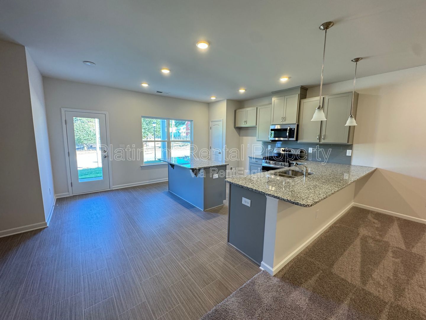 Better than new, 3 bedroom townhome in highly desirable Sugar Hill community by Platinum Property Management Services, Inc. property image