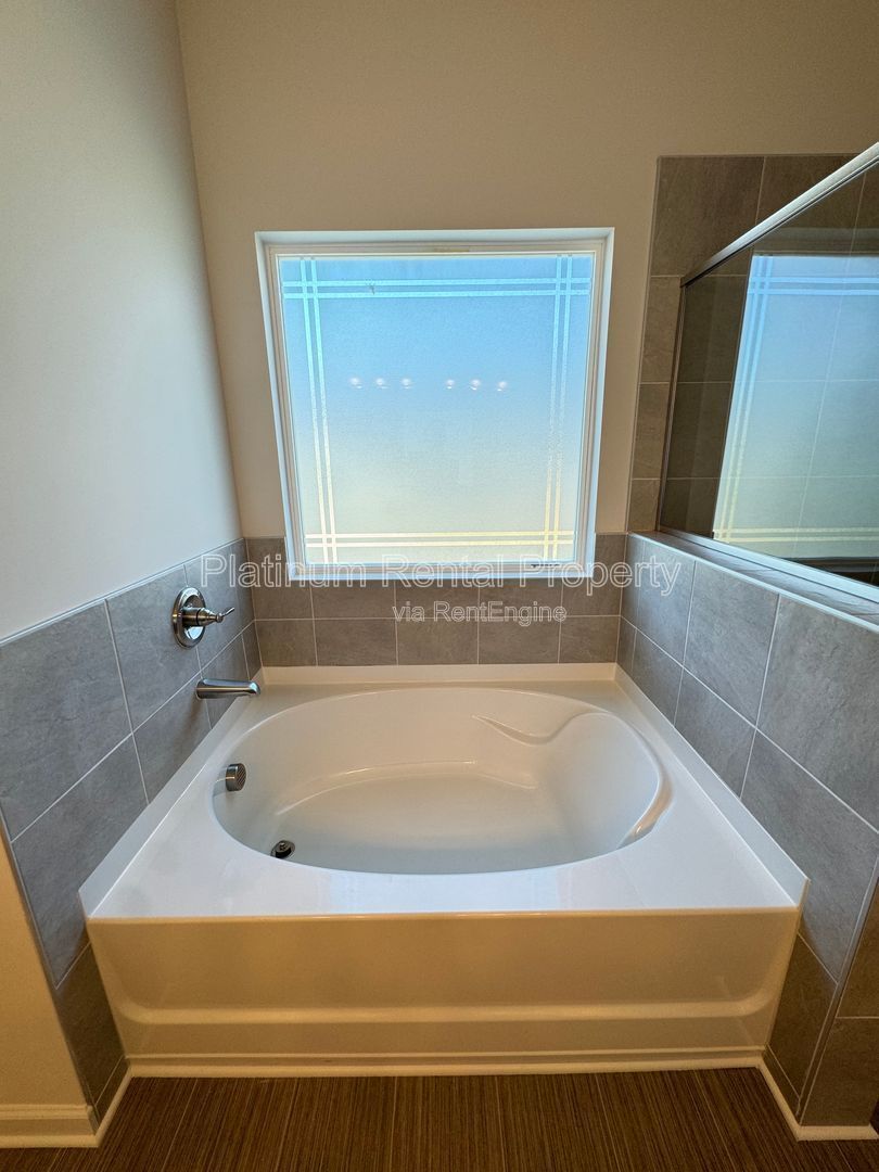 Better than new, 3 bedroom townhome in highly desirable Sugar Hill community by Platinum Property Management Services, Inc. property image