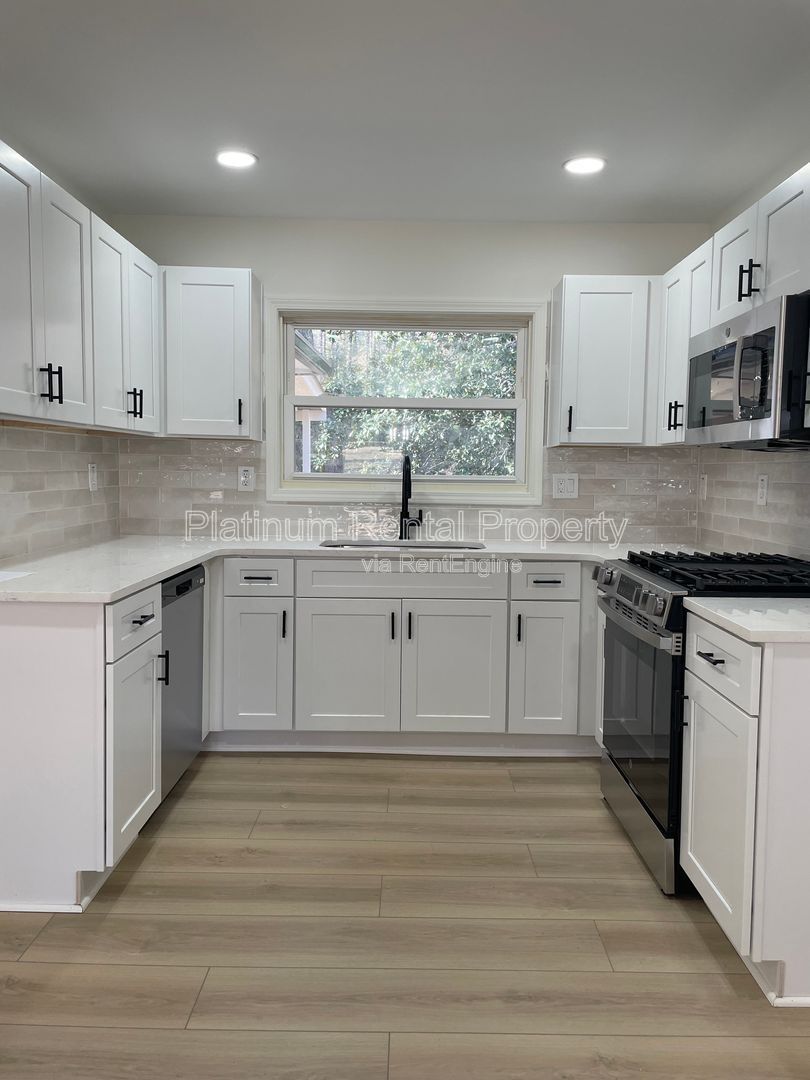 Simply exquisite, 1960's brick ranch on a basement in fantastic Cascade location, by Platinum Property Management Services, Inc. property image