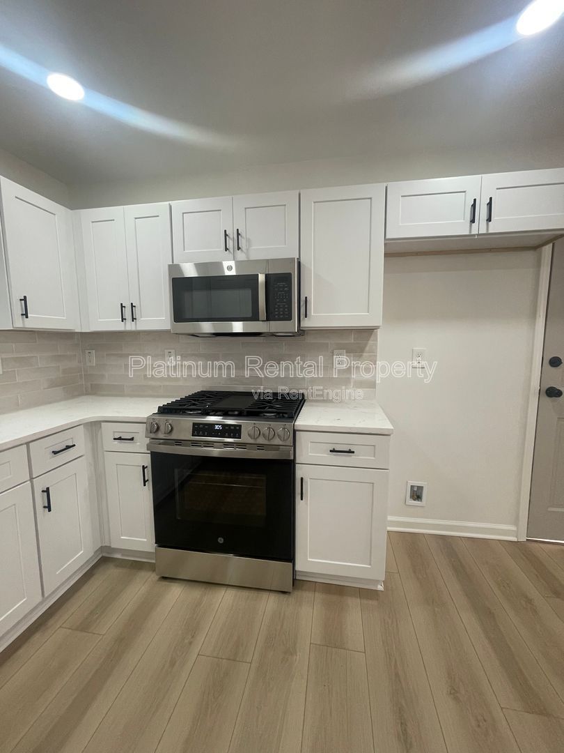 Simply exquisite, 1960's brick ranch on a basement in fantastic Cascade location, by Platinum Property Management Services, Inc. property image