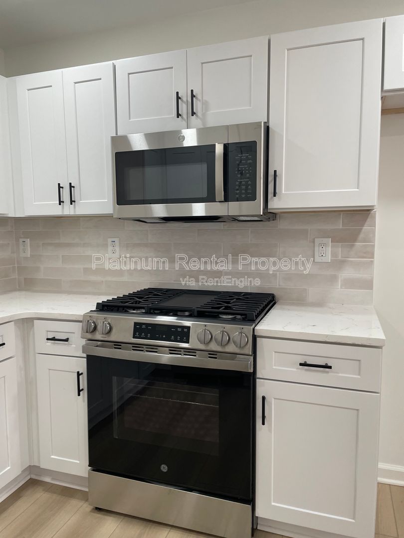 Simply exquisite, 1960's brick ranch on a basement in fantastic Cascade location, by Platinum Property Management Services, Inc. property image