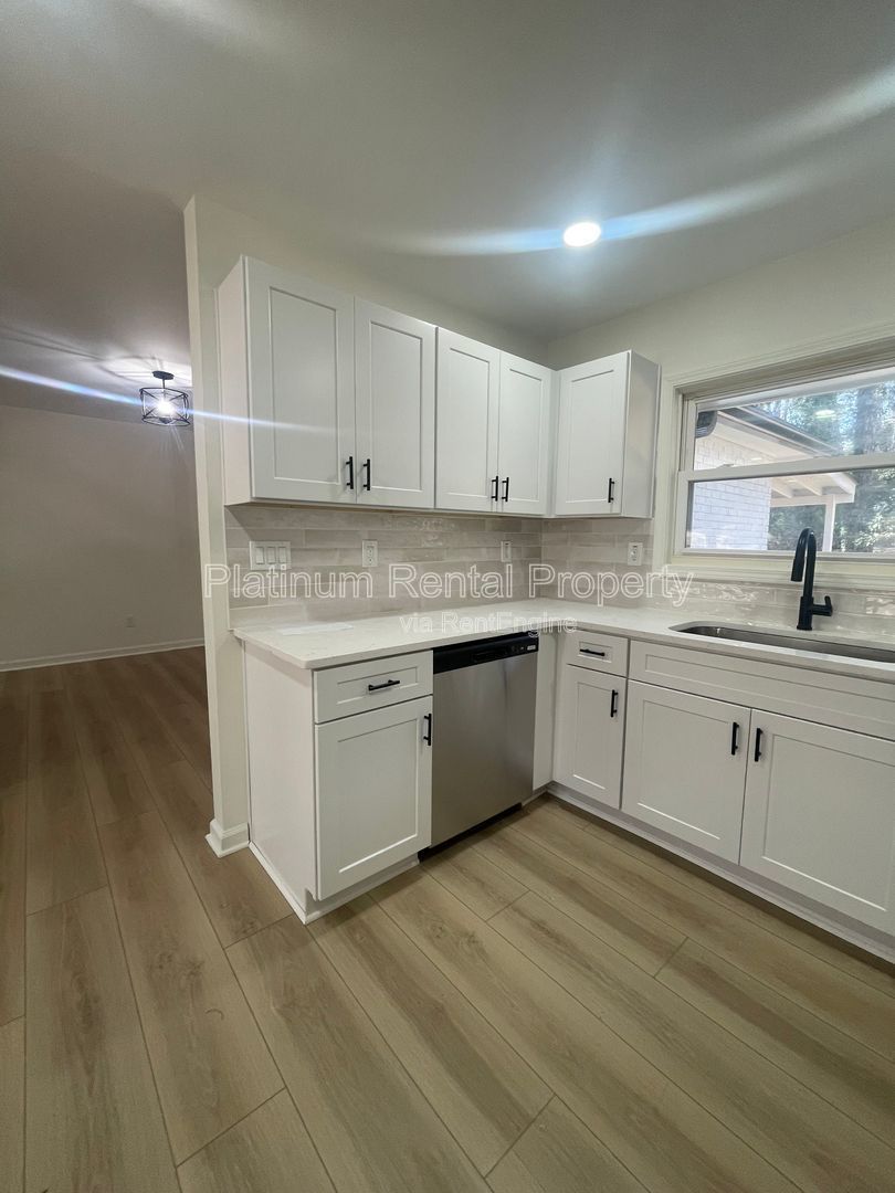 Simply exquisite, 1960's brick ranch on a basement in fantastic Cascade location, by Platinum Property Management Services, Inc. property image