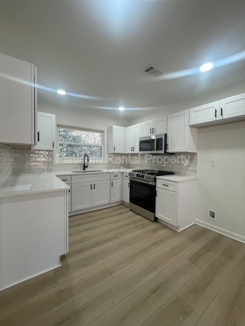 Simply exquisite, 1960's brick ranch on a basement in fantastic Cascade location, by Platinum Property Management Services, Inc. property image